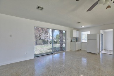 The Heart of Old Florida Awaits in this 3 BD/1 BA/1GA! Step back - photo 12