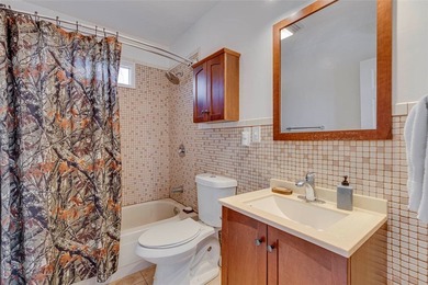 This beautifully updated 3-bedroom, 2-bath home is tucked into - photo 17
