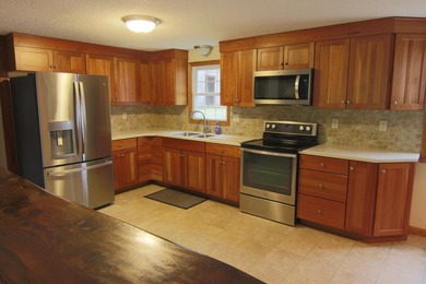 A rare Wells opportunity: this 3-bed, 2-bath ranch sits on 2.25 - photo 6