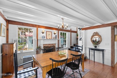 Anchored by a magnificent 400 year old live oak at the front of - photo 13