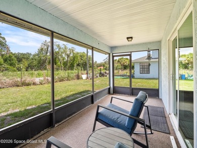 Tucked down a private road in the heart of Titusville, this - photo 20