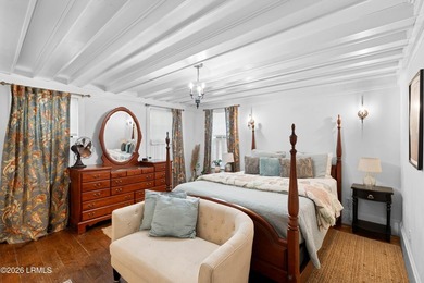 Anchored by a magnificent 400 year old live oak at the front of - photo 22