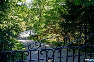 Private resort-style estate set on 6.5 gated acres. Surrounded - photo 24