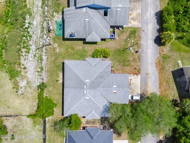 Tucked down a private road in the heart of Titusville, this - photo 30