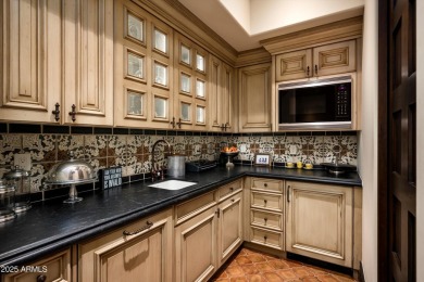 Perched in the coveted Upper Canyon of Silverleaf, this