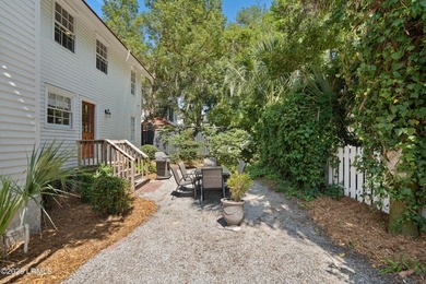 Anchored by a magnificent 400 year old live oak at the front of - photo 38