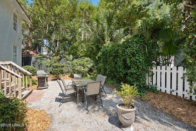 Anchored by a magnificent 400 year old live oak at the front of - photo 39