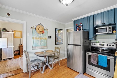 Anchored by a magnificent 400 year old live oak at the front of - photo 43
