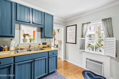 Anchored by a magnificent 400 year old live oak at the front of - photo 46