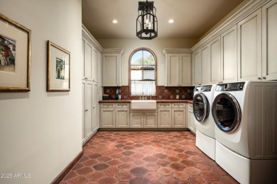 Perched in the coveted Upper Canyon of Silverleaf, this