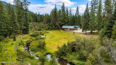 This serene 1.25 acre property on Lamb Creek offers 200 ft. of - photo 1