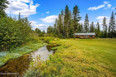 This serene 1.25 acre property on Lamb Creek offers 200 ft. of - photo 2