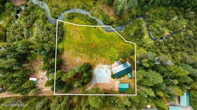 This serene 1.25 acre property on Lamb Creek offers 200 ft. of - photo 5