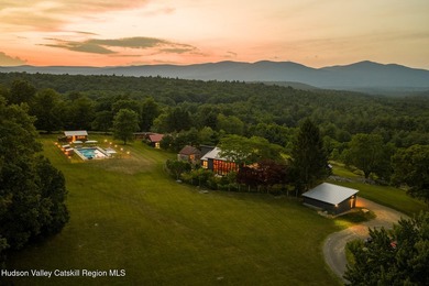 Set on 17 private acres with sweeping views across the Catskill - photo 1
