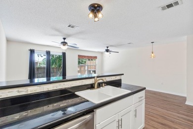 Move-in ready and ideally located, this beautifully maintained - photo 17