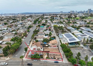 * FIXER * Large, 7,000+ sq. ft. corner lot with paved concrete - photo 50