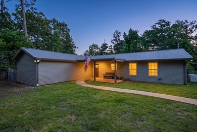 Nestled among the towering East Texas pines and surrounded by - photo 2
