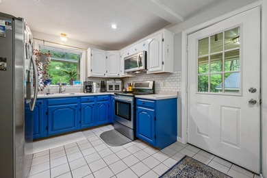 Charming 3 bedroom, 2 bath home set privately on 1+ acre in - photo 6