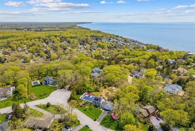 Set within the serene landscape of Rolling Woods in Riverhead - photo 11