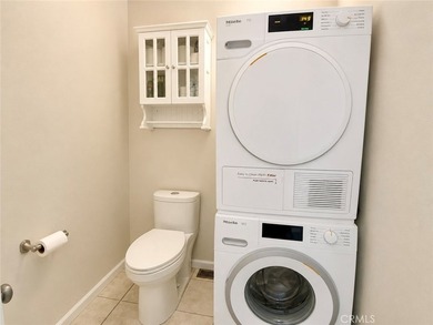 This 2-story condo offers comfortable living in the gated Coral - photo 11