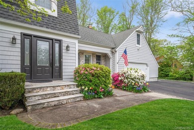Set within the serene landscape of Rolling Woods in Riverhead - photo 12