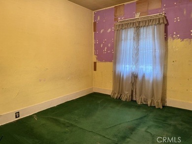 Walk into a open space living room with plenty of natural light - photo 12