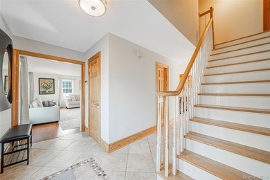 Set within the serene landscape of Rolling Woods in Riverhead - photo 13