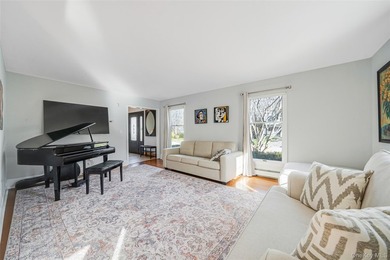Set within the serene landscape of Rolling Woods in Riverhead - photo 17