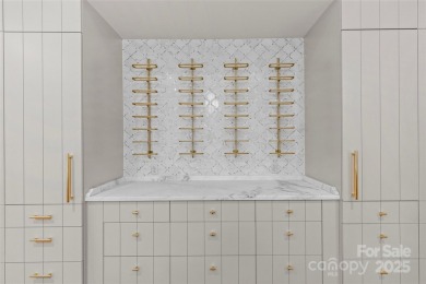 Exquisite 3BR, 3.5BA residence in The Nolen on Queens Road, one