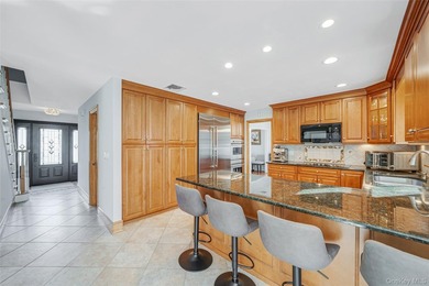 Set within the serene landscape of Rolling Woods in Riverhead - photo 23
