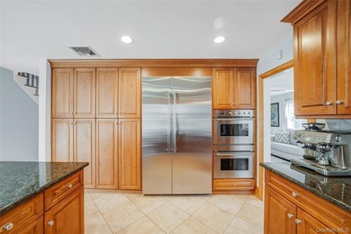 Set within the serene landscape of Rolling Woods in Riverhead - photo 25
