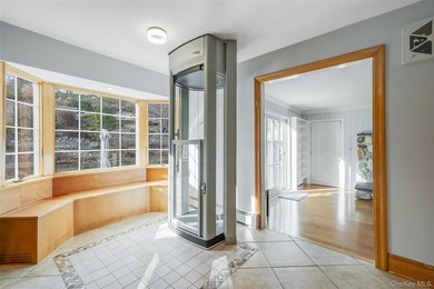Set within the serene landscape of Rolling Woods in Riverhead - photo 26