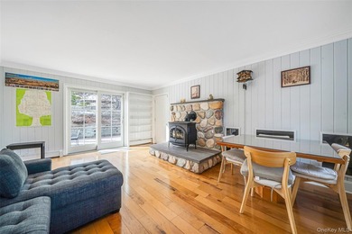 Set within the serene landscape of Rolling Woods in Riverhead - photo 28
