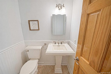 Set within the serene landscape of Rolling Woods in Riverhead - photo 29
