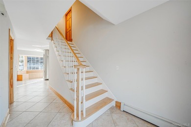 Set within the serene landscape of Rolling Woods in Riverhead - photo 30