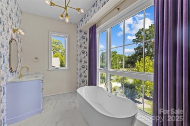 Exquisite 3BR, 3.5BA residence in The Nolen on Queens Road, one
