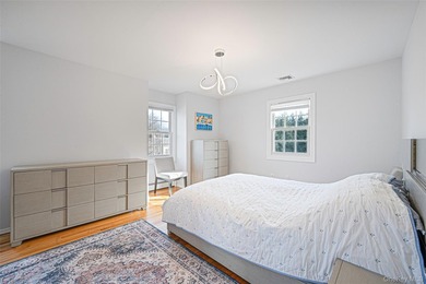 Set within the serene landscape of Rolling Woods in Riverhead - photo 37