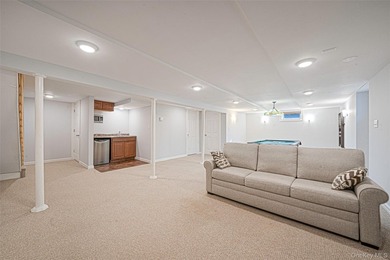 Set within the serene landscape of Rolling Woods in Riverhead - photo 45