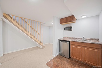 Set within the serene landscape of Rolling Woods in Riverhead - photo 47
