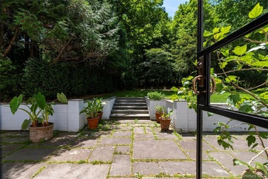 Down a long and winding private 1/4 mile country driveway, this - photo 11