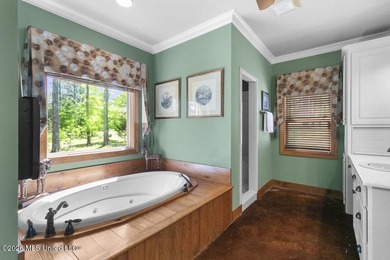 Welcome to this exceptional waterfront home located in the gated - photo 16