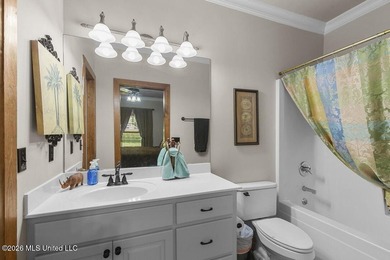 Welcome to this exceptional waterfront home located in the gated - photo 19