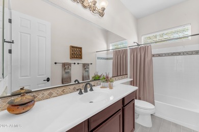 Welcome to this beautifully updated single-level home that