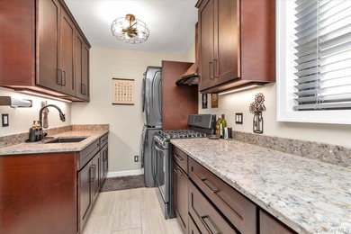 Welcome home to this sun-filled spacious renovated two-bedroom - photo 6
