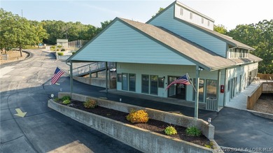 Escape to the stunning Lake of the Ozarks with this charming - photo 19