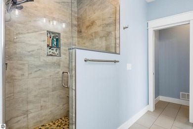 Perched above West Grand Traverse Bay with sweeping water views - photo 32