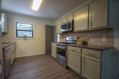 Newly renovated year-round cottage on the Eagle River Chain of - photo 17