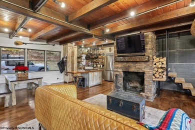 Tucked away on a serene 2-acre wooded lot in the highly - photo 4