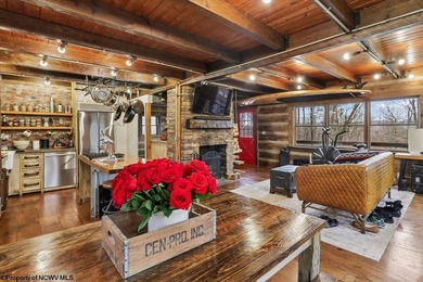 Tucked away on a serene 2-acre wooded lot in the highly - photo 5