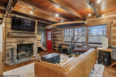 Tucked away on a serene 2-acre wooded lot in the highly - photo 6